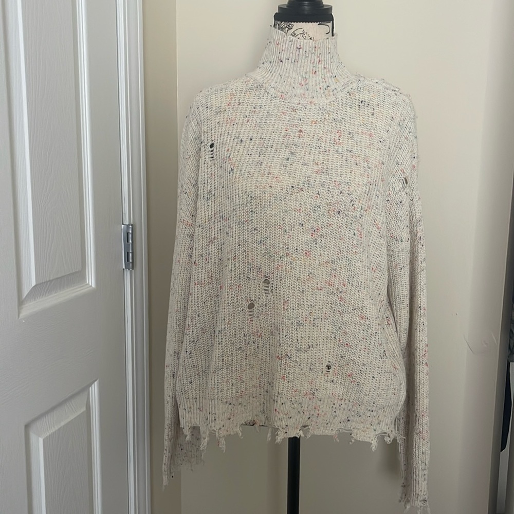 Ripped multi color sweater